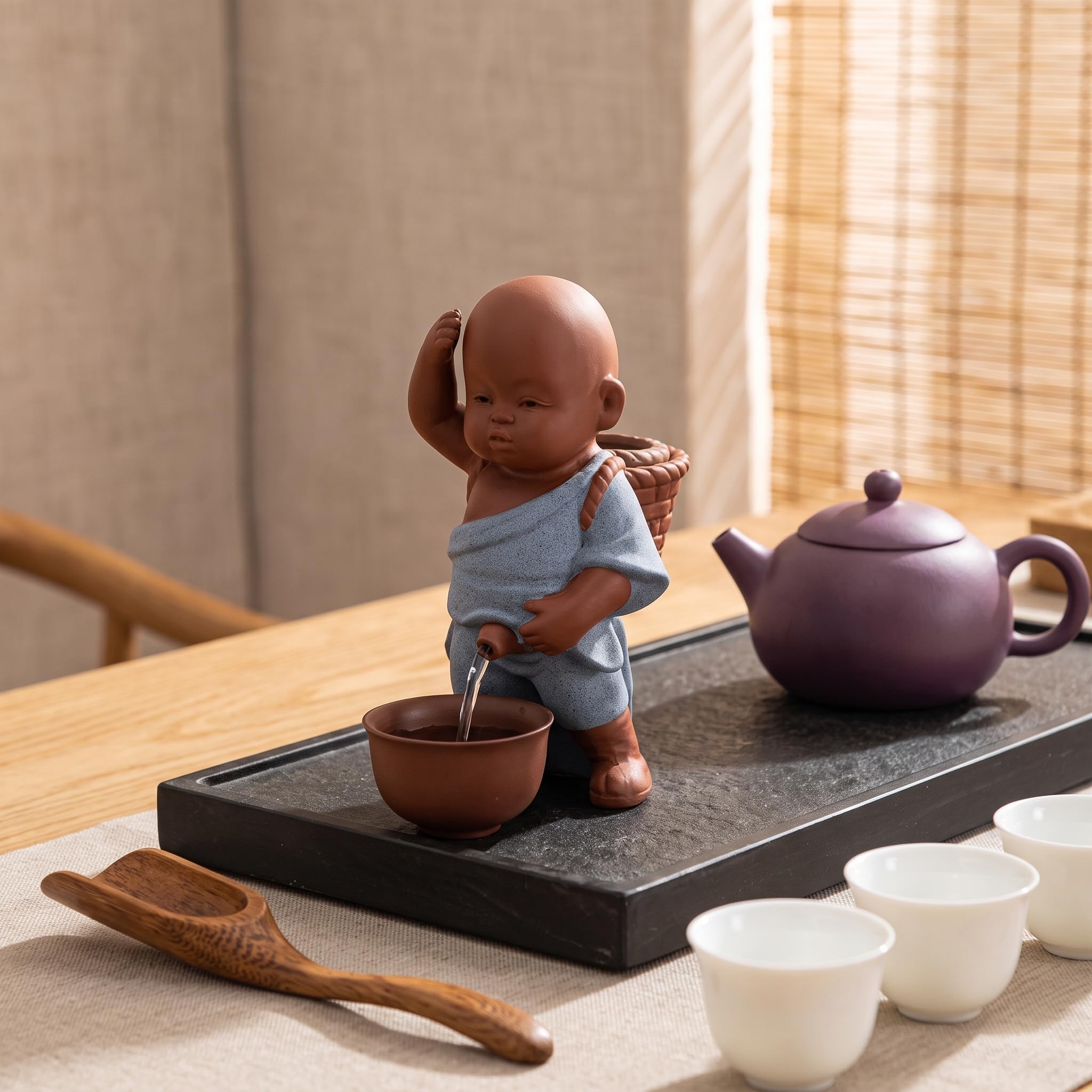 Ceramic Little Monk Tea Infuser with Creative Water Spray Design