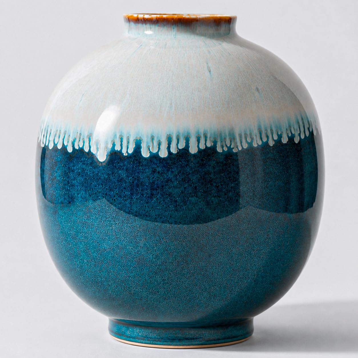 9.8-Inch Blue Reactive Glaze Ceramic Vase with Rounded Silhouette